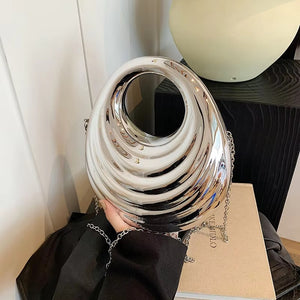 Radiant Silver Metallic sculpted Handbag.